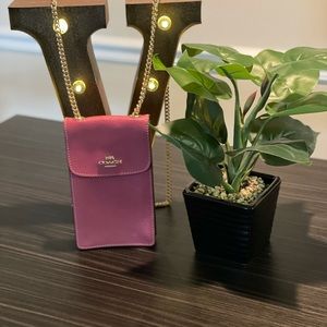 Coach leather crossbody cellphone purse.